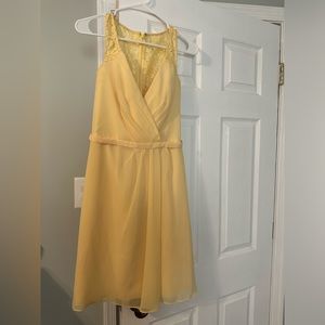 Yellow wedding guest or bridesmaid dress.